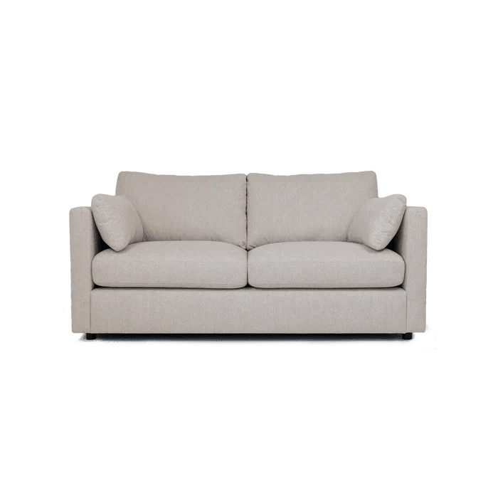 Cream fabric sofa with plush cushions and clean, modern lines, ideal for living rooms.