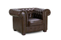 Chesterfield leather armchair in antique brown with tufted back and classic rolled arms