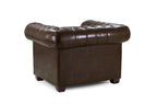 Antique brown Chesterfield leather armchair with tufted back and arms on white background
