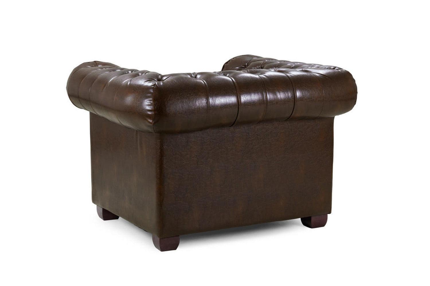 Antique brown Chesterfield leather armchair with tufted back and arms on white background