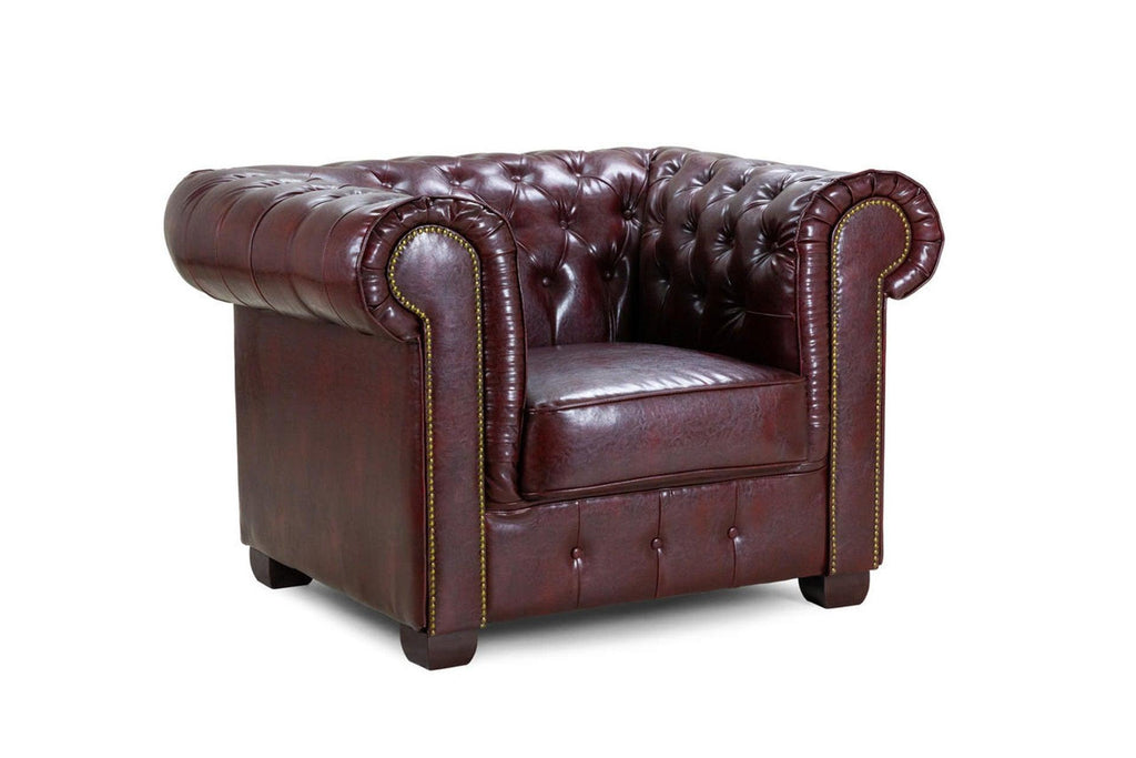Oxblood chesterfield leather armchair with tufted back and rolled arms on white background