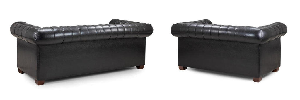 Black leather Chesterfield sofa set with tufted backs and wooden feet, rear view