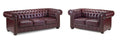 Oxblood leather Chesterfield sofa set with tufted back, rolled arms, and nailhead trim