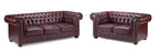 Oxblood leather Chesterfield sofa set with tufted back, rolled arms, and nailhead trim