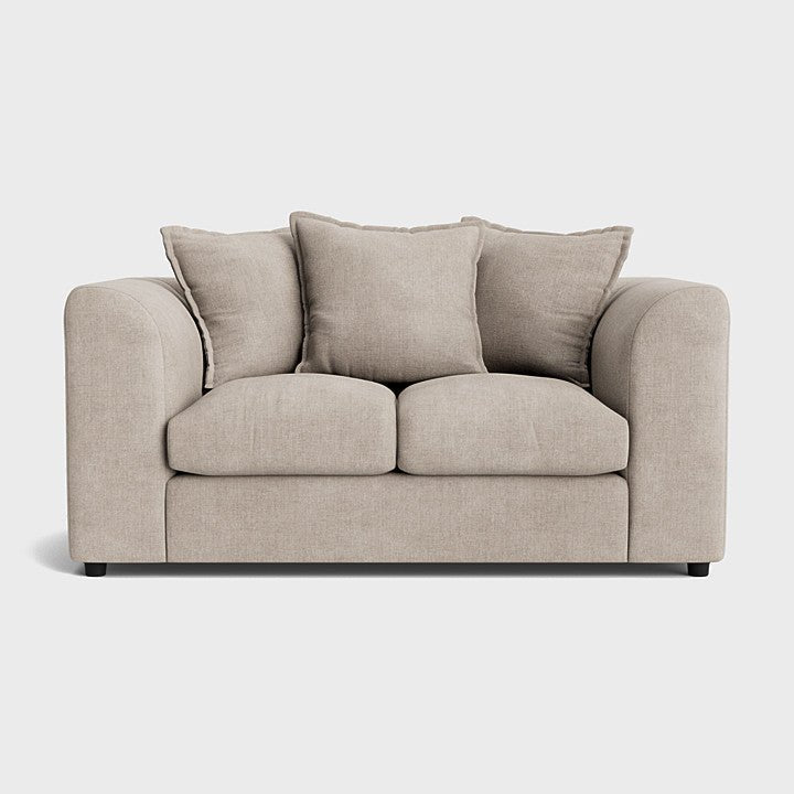 Cream fabric left corner sofa with plush cushions and rounded arms on white background