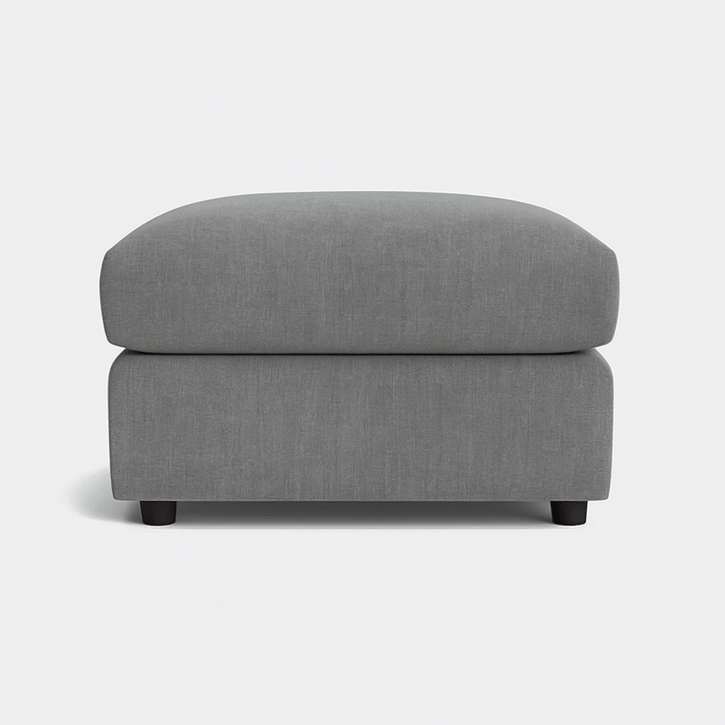 Modern grey fabric ottoman with short black legs, minimalist style, on white background