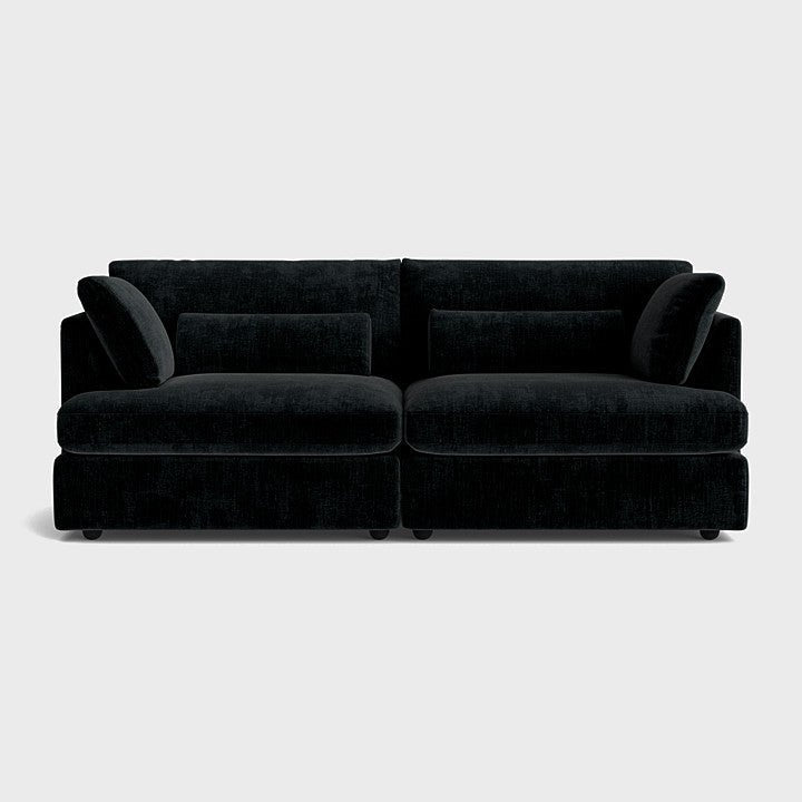 Modern black chenille 3-seater sofa set with plush cushions on a plain background