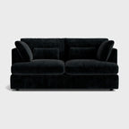 Black chenille two-seater sofa with plush cushions on a white background