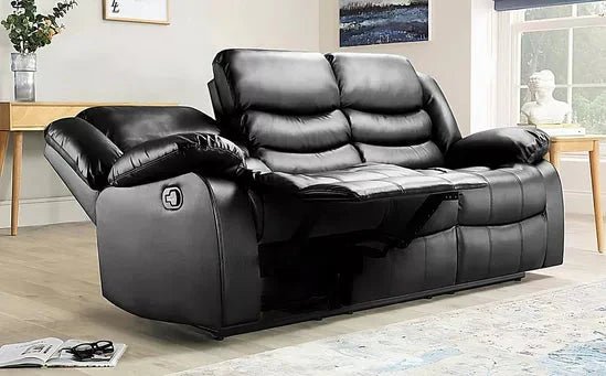 Black 3-seater leather reclining sofa with plush cushions in a modern living room