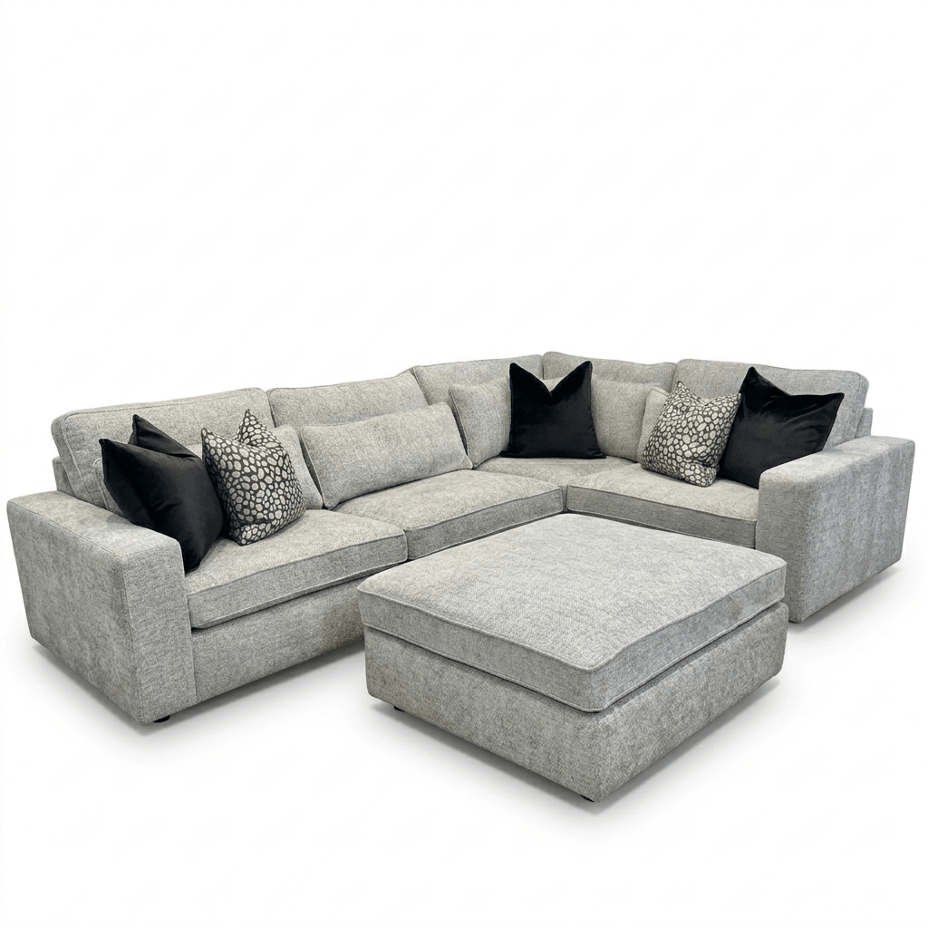Modern 4-piece ash grey corner sofa with ottoman and black accent pillows
