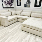 Oatmeal fabric 4-piece corner sofa with chaise in modern living room, light wood flooring