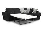 Black left-facing corner sofa bed with plaid and deer print scatter cushions on white background