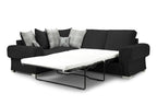 Black corner sofa bed with plaid and stag scatter cushions, right-facing design