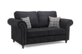 Black two-seater sofa with rolled arms, studded trim, and plaid scatter cushions