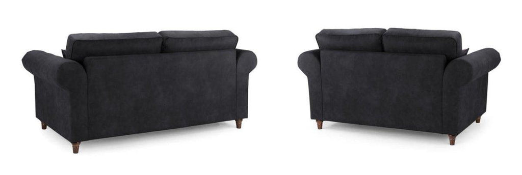 Black three and two seater sofa set with rolled arms and wooden legs, rear view