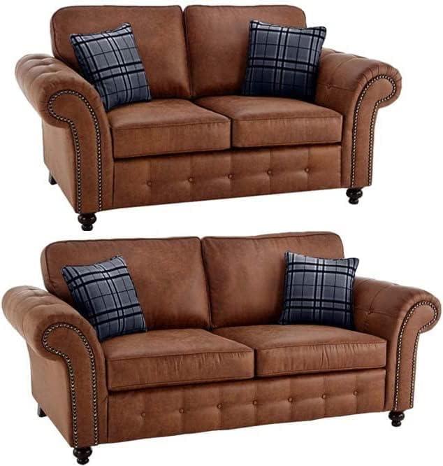 Brown leather sofa set with rolled arms and plaid accent pillows, 3 and 2 seater sofas