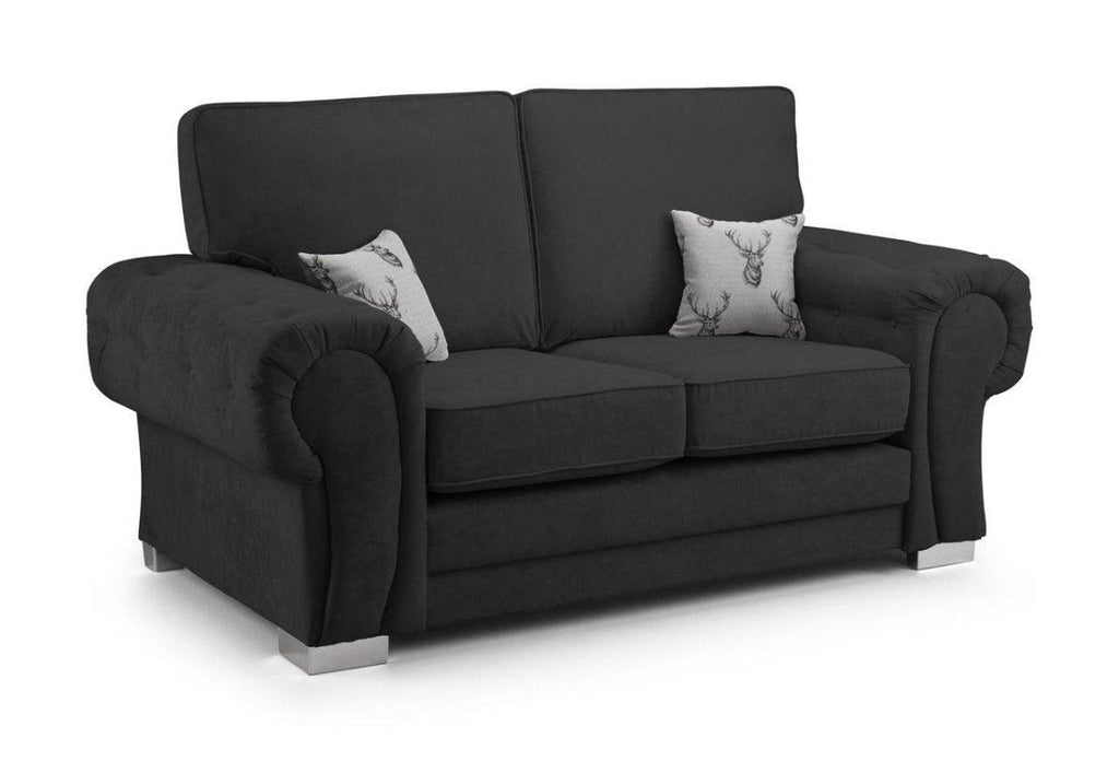 Black two-seater sofa with full back, silver legs, and two decorative stag cushions