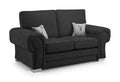 Black two-seater sofa with full back, silver legs, and two decorative stag cushions