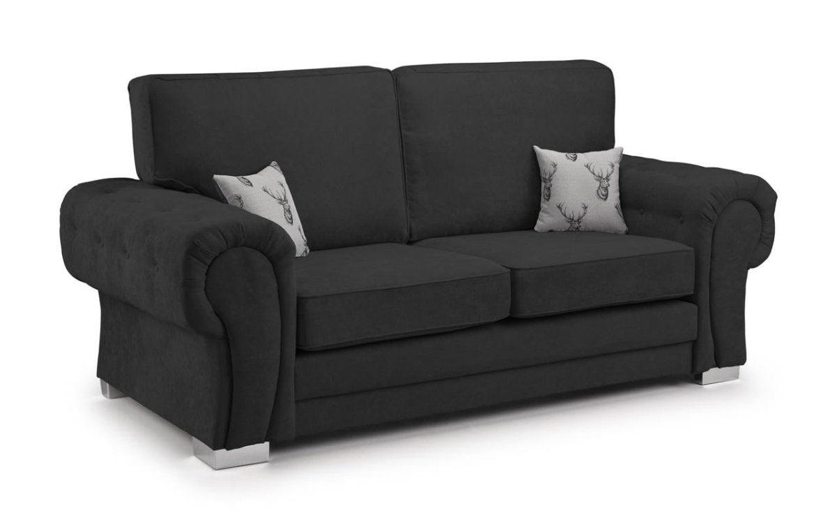 Modern black velvet 3 seater sofa with rolled arms, silver legs, and two deer print cushions