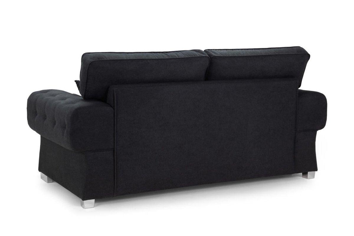 Black 3 seater sofabed with full back, tufted armrests and chrome legs on white background