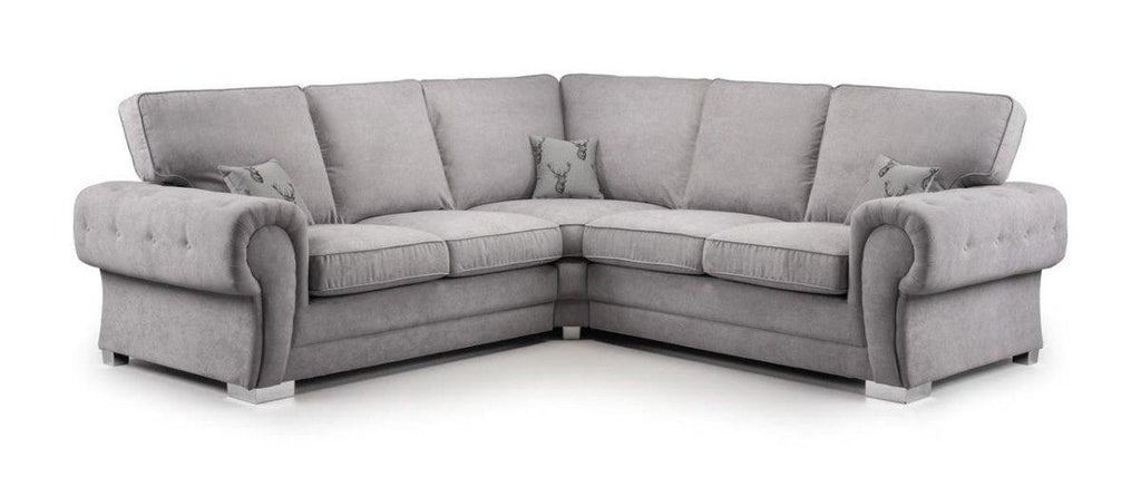 Grey corner sofa with full back cushions and rolled arms, includes matching throw pillows