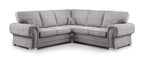 Grey corner sofa with full back cushions and rolled arms, includes matching throw pillows