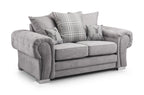 Light grey scatterback 2 seater sofa with plaid and stag cushions, plush upholstery