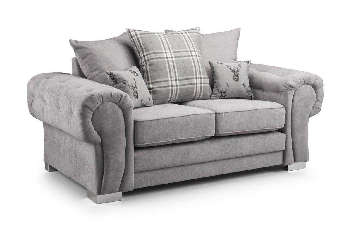 Light grey scatterback 2 seater sofa with plaid and stag cushions, plush upholstery