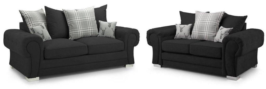 Black fabric sofa set with rolled arms, plaid and deer print scatter cushions, silver feet