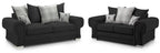 Black fabric sofa set with rolled arms, plaid and deer print scatter cushions, silver feet