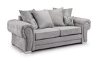 Grey velvet 3 seater sofa with scatterback cushions, plaid and stag print pillows