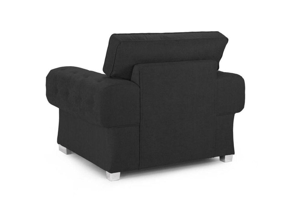 Black velvet armchair with scatter back and chrome feet, modern luxury seating