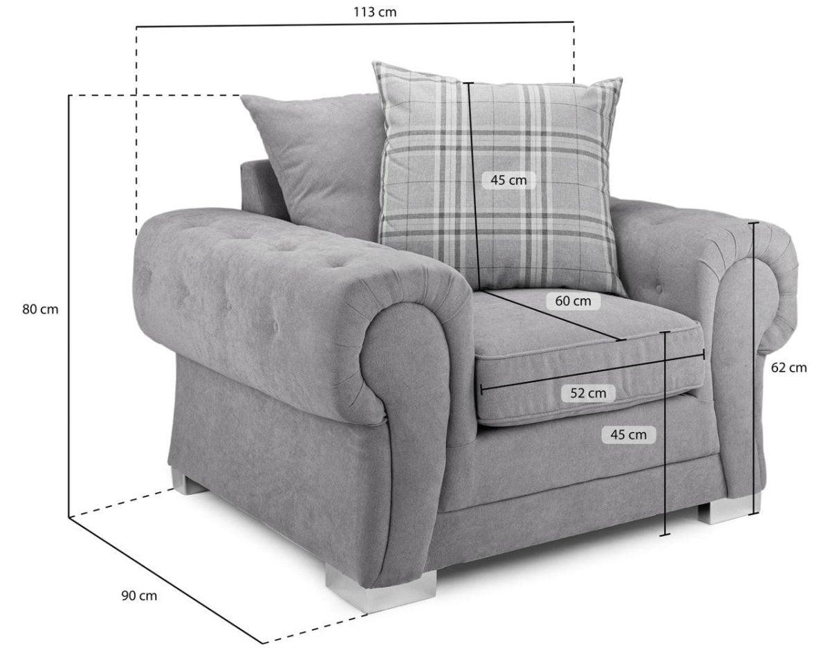 Grey scatterback armchair with rolled arms, button details, plaid cushion, and precise measurements.