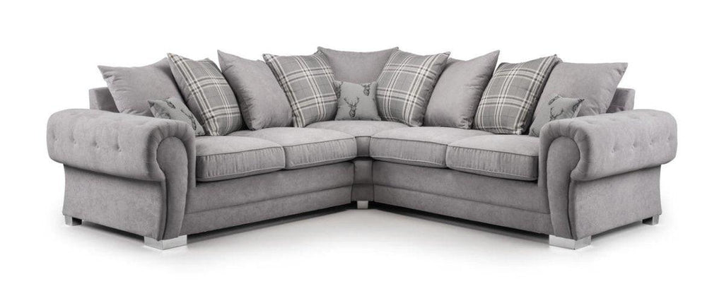 Light grey corner sofa with scatterback cushions and plaid accents, modern living room furniture