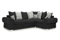 Black left-hand corner sofa with scatterback cushions in plaid and deer print, modern design