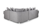Light grey corner sofa with scatter back cushions and modern block feet on white background