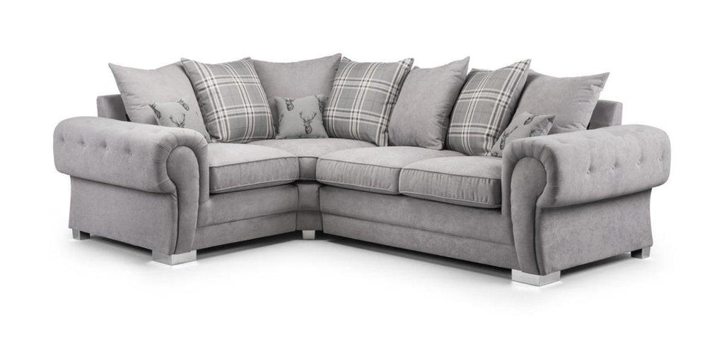 Grey corner sofa with scatterback cushions and plaid accents, modern tufted arms