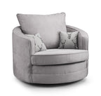 Light grey swivel accent chair with two stag print cushions and a large back cushion