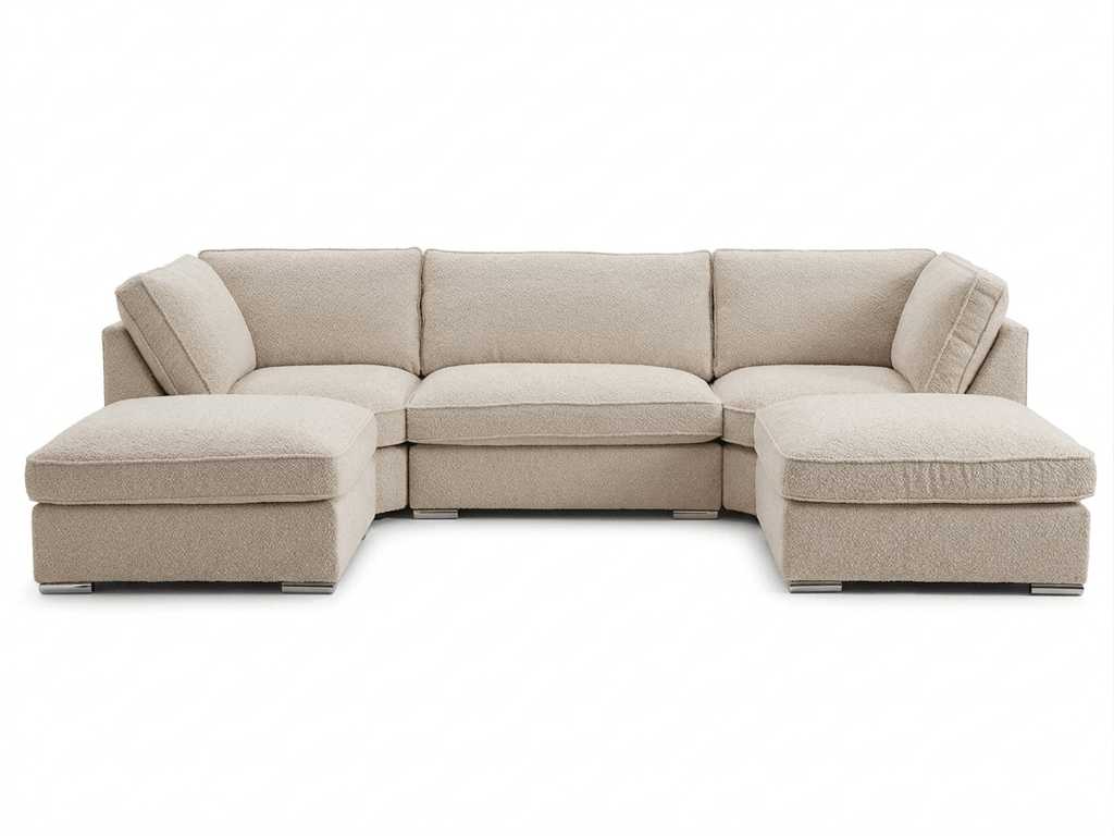 Large cream boucle U-shaped sofa with deep cushions and modern minimalist design
