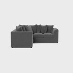 Modern cream double corner sofa with plush cushions on a light background