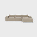 Modern cream modular corner sofa with right chaise, three seats, minimalist setting