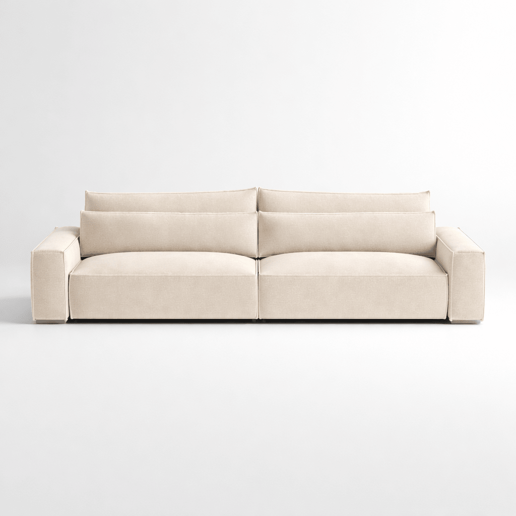 Modern cream four-seater sofa with deep seats and wide armrests on a white background