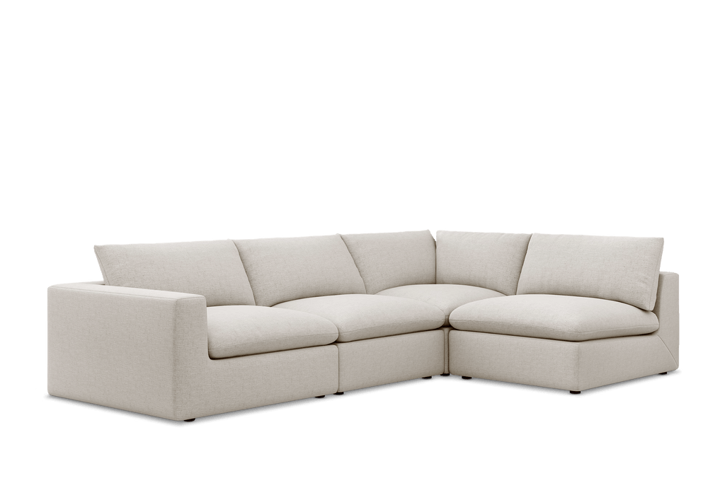 Cream corner sofa with feather-filled cushions and modern minimalist design