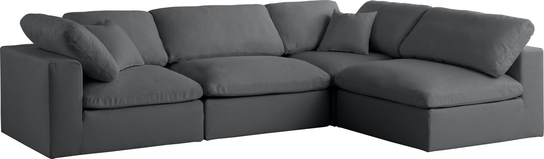 Modern cream feather-filled corner sofa with deep seats and plush back cushions