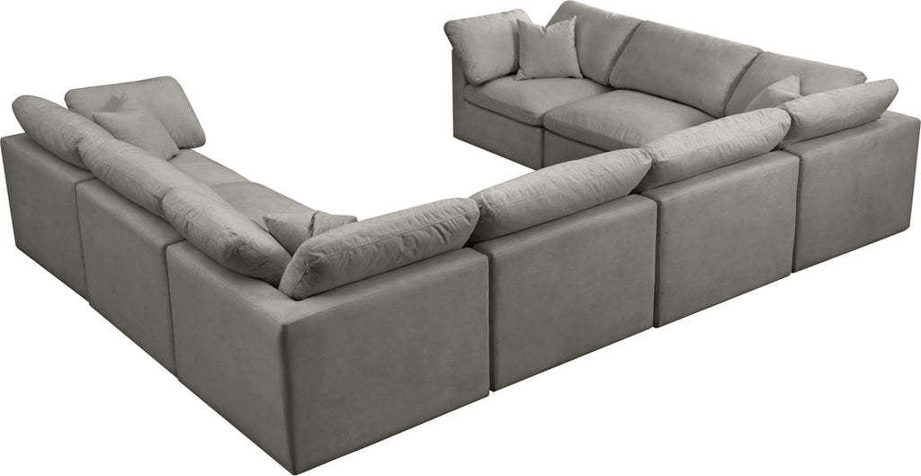 Cream U-shape sectional sofa with feather-filled cushions and plush seating