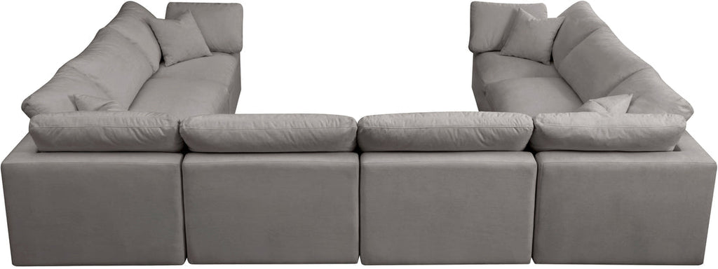 Cream U-shaped sectional sofa with feather-filled cushions, modern living room seating