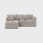 Cream fabric corner sofa with chaise, plush cushions, and modern minimalist design