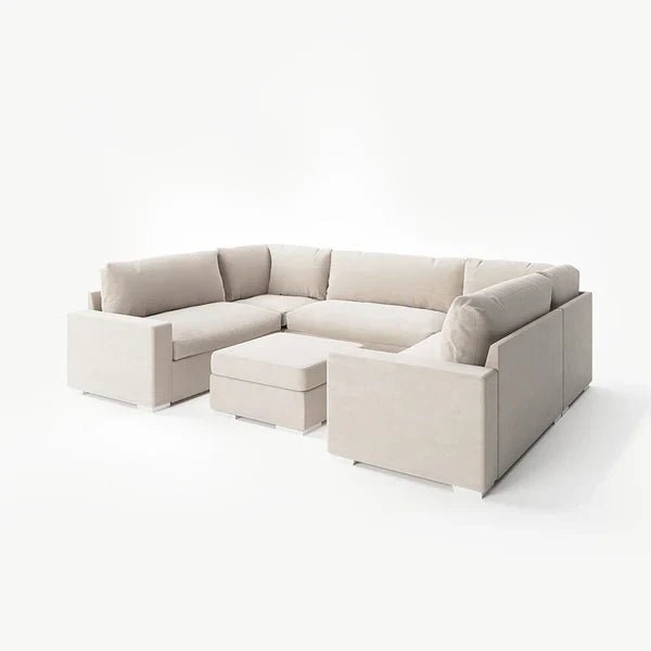 Cream U-shape sectional sofa with fiber-topped cushions and matching ottoman on white background
