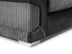 Close-up of modern grey corduroy and black faux leather sofa corner with metal leg