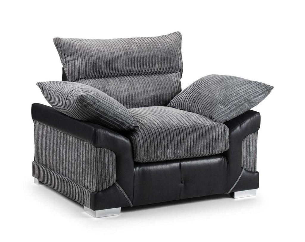 Modern grey corduroy and black leather armchair with plush cushions on a white background.